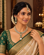 Vasundhara Emerald Kundan Pearl Necklace Set